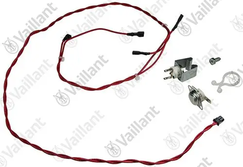 Vaillant Sensor mit Kabel, bestehend aus mehreren Leitungen und Anschlüssen, montiert zusammen mit einem Kunststoffteil und weiteren Zubehörkomponenten.